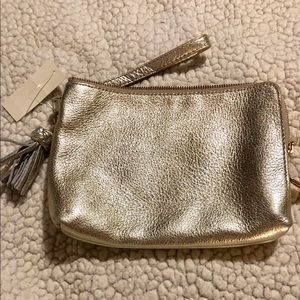 NWT Gold leather wristlet with 2 zipped enclosures